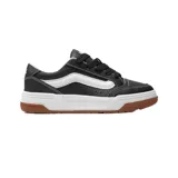 Championes Vans Hylane unisex, inspirados en el año 2000. Diseño en cuero y material sintético negro con Sidestripe™ blanca acolchada, lengüeta acolchada inspirada en las zapatillas de skate de los 2000, suela cóncava y suela waffle de diseño inverso con logotipo de Vans de gran tamaño y ranuras flexibles.