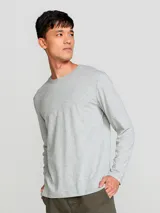 Camiseta básica unisex de manga larga, color gris oscuro, de corte regular y tacto suave.