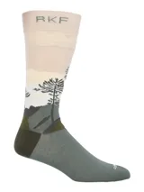 Calcetines largos con diseño de árboles en tonos verdes y grises sobre fondo beige.
