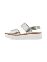 Sandalias plateadas con plataforma negra, tiras anchas con ajuste de velcro y plantilla de cuero.