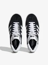 Zapatillas Adidas Gazelle Bold para mujer, color negro con las tres tiras blancas y plataforma de triple capa color crema.