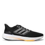 Championes Adidas Ultra Bounce color negro con detalles en gris y suela blanca con detalles en naranja.
