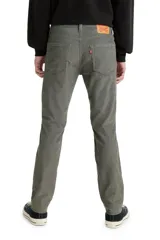 Pantalón de pana color gris, corte slim fit, tiro medio.