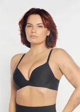 Soutien color piel de microfibra sin costuras, preformado con copa soft triangular y aro invisible. Breteles regulables.