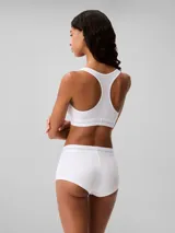 Bombacha hípster blanca de algodón modal con textura de canalé y cintura elástica con logo Calvin Klein.