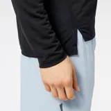 Remera técnica de running de manga larga para hombre, confeccionada en poliéster ligero con tecnología NB DRYx para mantenerte seco y cómodo.