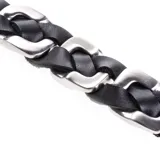 Pulsera trenzada en cuero negro con cierre magnético de acero inoxidable antialérgico.