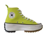 Zapatillas altas de color lima con suela gruesa de plataforma y diseño moderno.