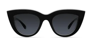 Lentes de sol negros estilo cateye con protección UV 400. Lentes polarizados japoneses con tratamiento antirayaduras y film superhidrofóbico. Marco de policarbonato francés.