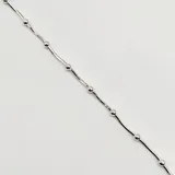 Pulsera semirrígida de plata 925 con eslabones tipo serpiente y pequeñas esferas distribuidas a lo largo de la cadena.