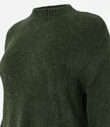 Suéter rosado de tejido de punto texturizado con cuello redondo y manga larga.