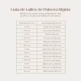 Pulsera rígida de plata con apliques de oro en los bordes y centro esmerilado.