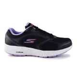 Zapatillas deportivas para mujer color negro con detalles en púrpura, diseñadas para correr y entrenar, con parte superior de malla transpirable y amortiguación ULTRA LIGHT.