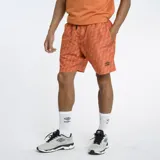 Short de baño color naranja con diseño geométrico, tejido ligero y ajuste cómodo.