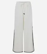Pantalón de playa de lino y viscosa color blanco, con rayas laterales a contratono, cintura elastizada y lazo ajustable.