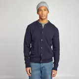 Cárdigan azul marino de punto de lana con cuello redondo y cierre frontal con botones.