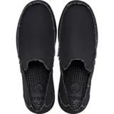Mocasín sin cordones marca Crocs, modelo Santa Cruz, con parte superior de lona negra y suela de material Croslite™. Presenta elásticos laterales para facilitar el calce y una plantilla ergonómica con textura de masaje.