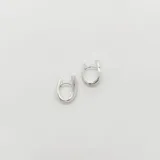 Par de aros argolla en plata 925 satinada con circonias incrustadas.