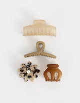 Set de cuatro broches para el pelo de diferentes tamaños y formas.