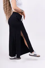 Pantalón palazzo negro de morley con lycra, corte amplio y cintura elastizada con cordón ajustable.