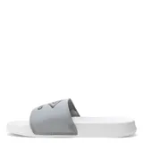 Chancletas Umbro Locker Room color lila con logo blanco.