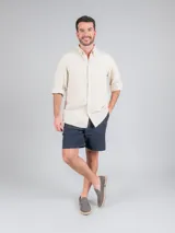 Mocasín gris de descarne con suela de goma y detalle de yute trenzado.