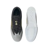 Zapatillas de fútbol en color negro y gris, con detalles dorados, diseño inspirado en Leo Messi y mediasuela de EVA suave.