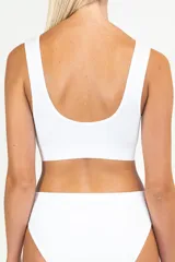 Soutien reductor color beige con breteles anchos y espalda deportiva.