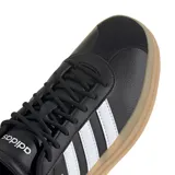 Championes Adidas VL Court Bold de mujer, color negro con las tres tiras blancas y detalles plateados. Plataforma con suela color caramelo.