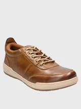 Championes de cuero color marrón con cordones, plantilla Smart Foam® y suela de goma.