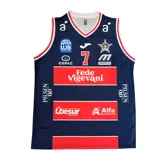 Camiseta de básquet Joma del club Unión Atlética, color azul con detalles en blanco y rojo. Presenta el número 7 en el frente y múltiples logos de sponsors. Sin mangas y cuello en V.