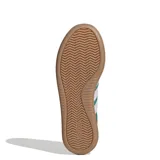 Championes Adidas Barreda Decode, color verde con detalles en blanco y suela marrón.