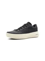 Championes Brandblack Downtown negros con suela texturizada color crema.