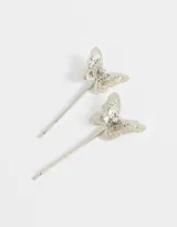 Set de dos horquillas doradas para el pelo con apliques de mariposas caladas y strass.