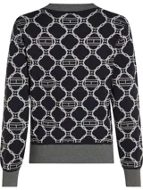 Sweater azul marino con diseño de rombos blancos con el logo de la marca en el centro. Tiene cuello redondo, puños y bajo acanalados.