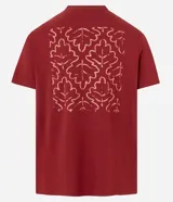 Remera color ladrillo de algodón peruano, corte comfort, cuello redondo y manga corta. Estampa con la palabra 'Natureza' y diseño de hojas en el pecho.