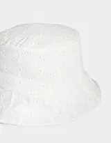 Piluso blanco con bordado de lazos.