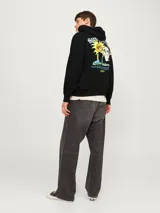 Hoodie negro con capucha y manga larga, de fit holgado y tejido loop back.