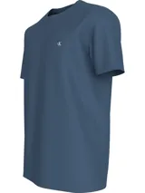 Remera azul de algodón con cuello redondo y logo CK bordado en el pecho.