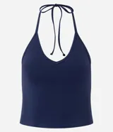 Blusa cropped de frente única color crema, confeccionada en algodón con elastano, con escote en V y lazo en el cuello.