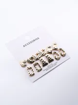 Set de seis pares de aros dorados con diferentes formas geométricas y textura martillada.