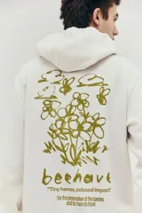Buzo canguro blanco de tejido liviano de felpa con interior cepillado suave, capucha de doble capa con cordón para ajustar, bolsillo canguro y remate acanalado ancho en puños y bajo.