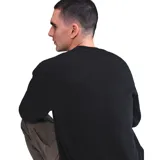 Sweater Nike Club negro de algodón con logo bordado en blanco en el pecho.