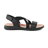 Sandalias negras con tiras cruzadas y ajuste con velcro en el tobillo.