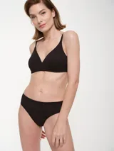 Colaless negra de algodón con elástico fino en la cintura.