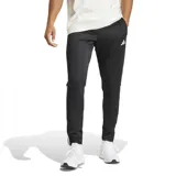 Pantalón deportivo Adidas Sereno Cut 3 para hombre, color negro con logo blanco y tres tiras blancas a lo largo de la pierna. Confeccionado con tecnología AEROREADY y materiales reciclados.