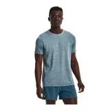 Remera deportiva gris jaspeado de corte clásico, con cuello redondo y mangas cortas. Confeccionada con tejido de punto transpirable y tecnología seamless para mayor comodidad.