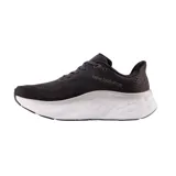 Championes de running New Balance Fresh Foam X More V4, color negro con logo "N" en marrón y suela blanca con tecnología Fresh Foam X.