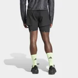 Short de running Adidas negro con calza interior ajustada. Cuenta con cintura elástica con cordón de ajuste, bolsillo lateral en la calza interior y detalles reflectantes.