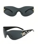 Lentes de sol negros con forma ovalada y apliques de estrellas plateadas en los laterales.